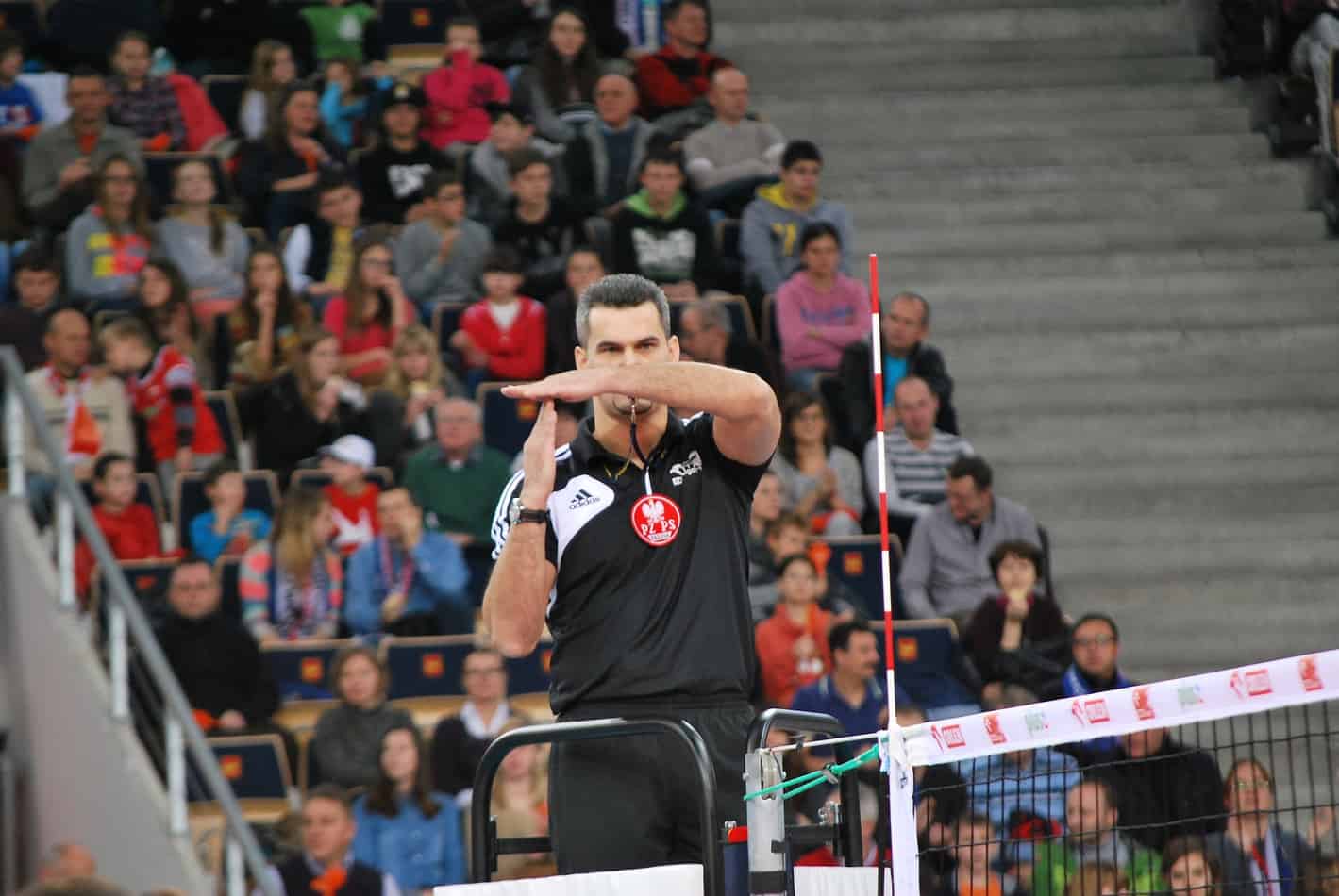 volleyball referee signals sand