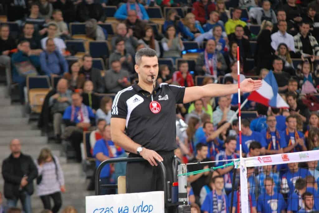 fist referee signal in volleyball